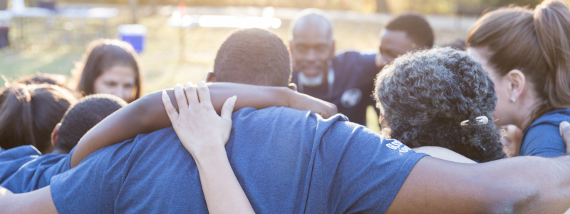 group of people embracing